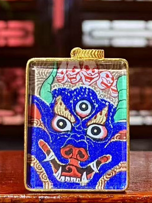 Front view of Yamantaka Vajrabhairava thangka pendant hand-painted in 18K gold, symbolizing supreme wisdom and the subjugation of obstacles