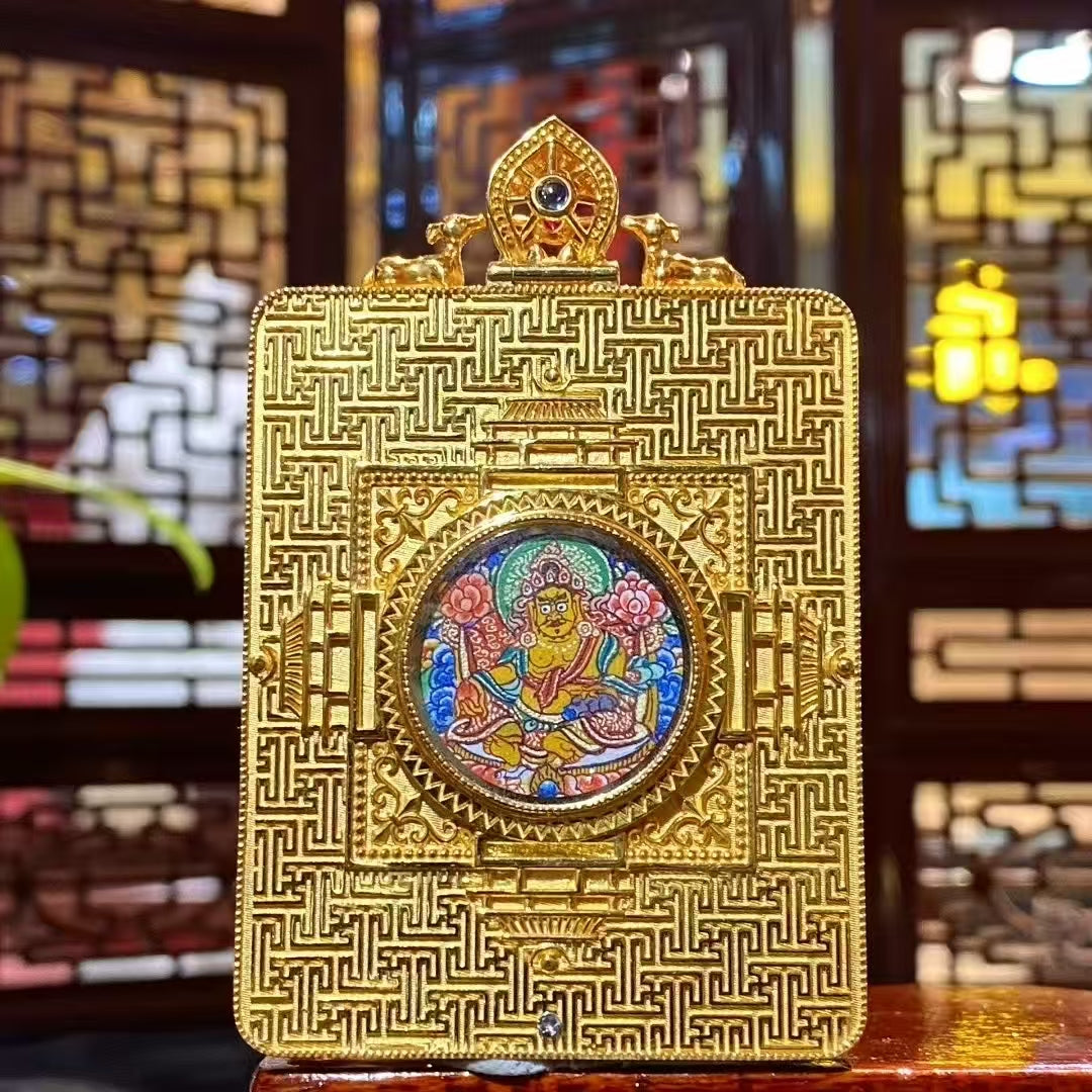 Back view of double-sided thangka pendant featuring Yellow Jambhala hand-painted in 18K gold, symbolizing wealth, protection, and merit accumulation