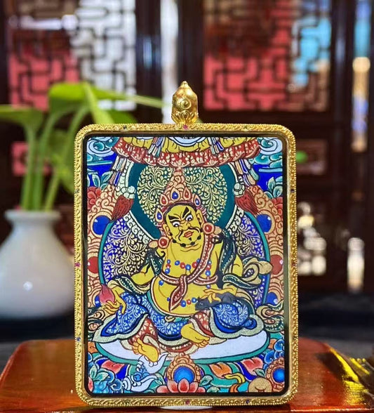 Hand-painted Yellow Jambhala Gau Thangka pendant in 18K gold, featuring the Tibetan God of Wealth in traditional Rebgong style with mineral pigments