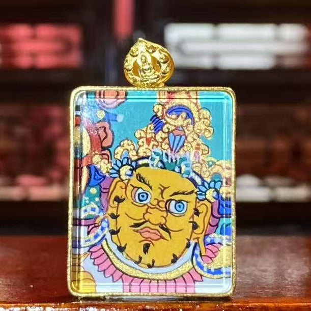 Back view of a double-sided hand-painted Gau Thangka pendant featuring Yellow Jambhala holding a jewel-spitting mongoose, symbolizing prosperity