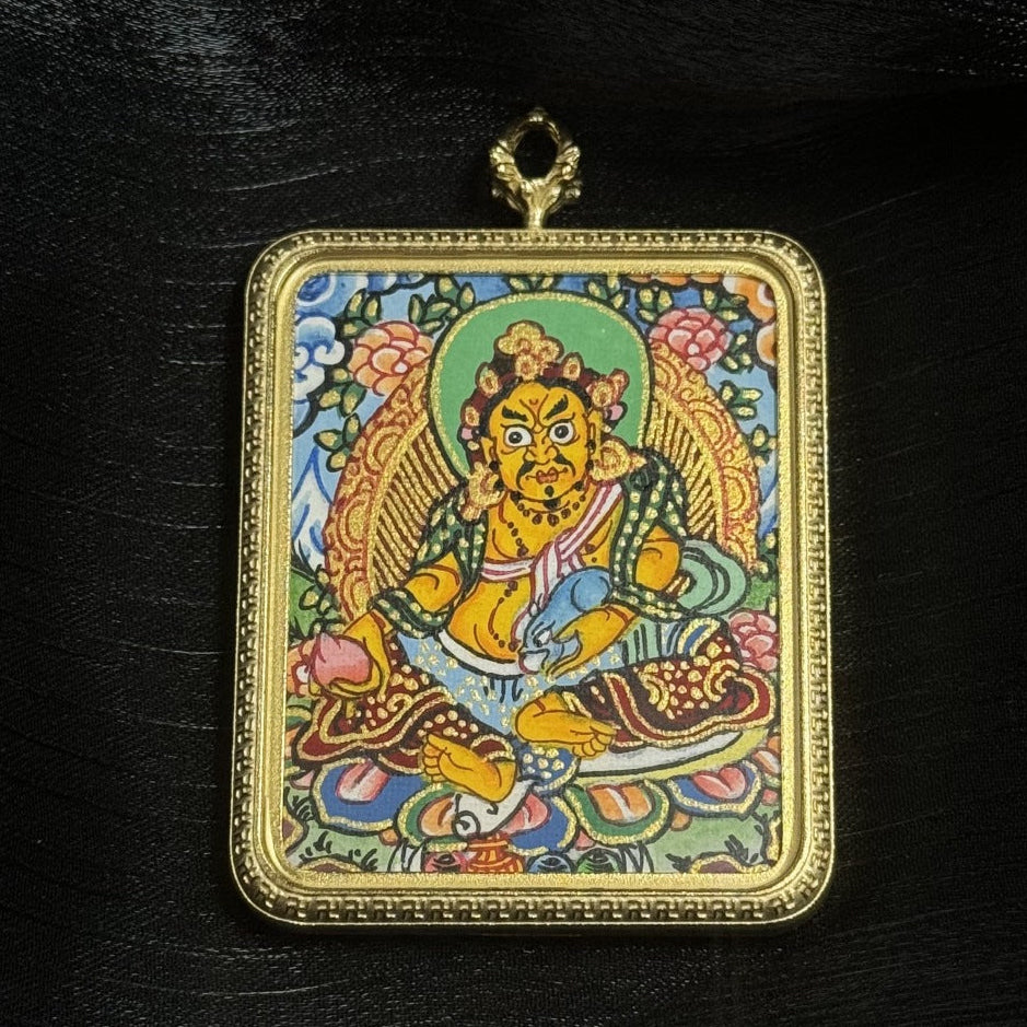 Hand-painted Yellow Jambhala mini thangka pendant from Nepal, depicting the Tibetan God of Wealth, 4×5 cm painting size with titanium steel case