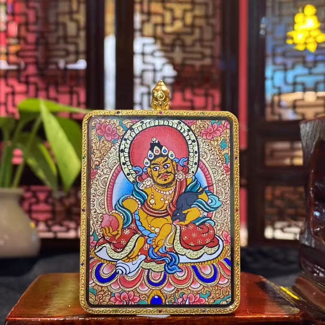 Back view of Tibetan Thangka pendant depicting Yellow Jambhala, god of wealth, fully hand-painted in 18K gold in the Rebgong tradition