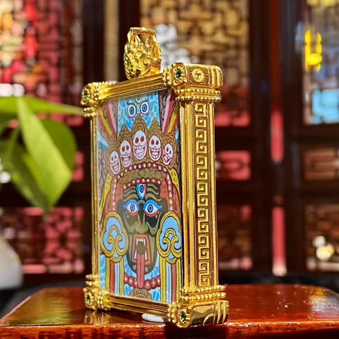 Side view of large Tibetan Gawu box pendant featuring a double-sided 18K gold hand-painted Thangka, sapphire crystal cover, Rebgong craftsmanship