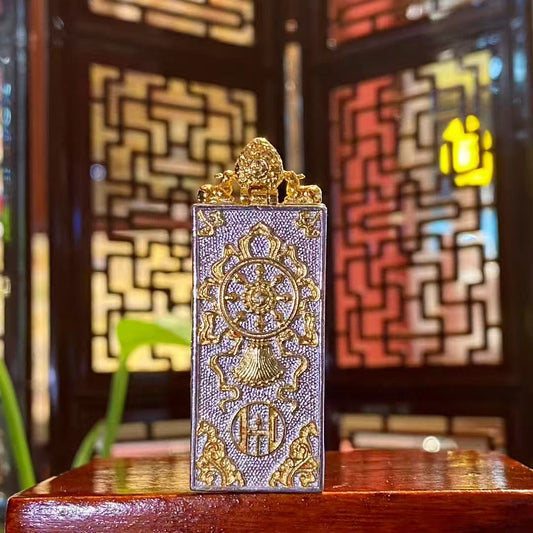 Back view of the Zaki Lhamo thangka pendant featuring a traditional Tibetan gau box design with engraved stupa motif and decorative metalwork