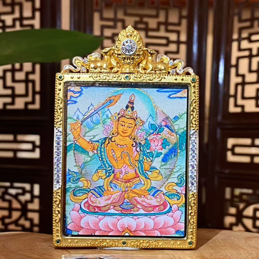 Hand-painted Manjushri Bodhisattva mini thangka pendant in a gold-plated copper Gau box, depicting the Buddhist deity of wisdom