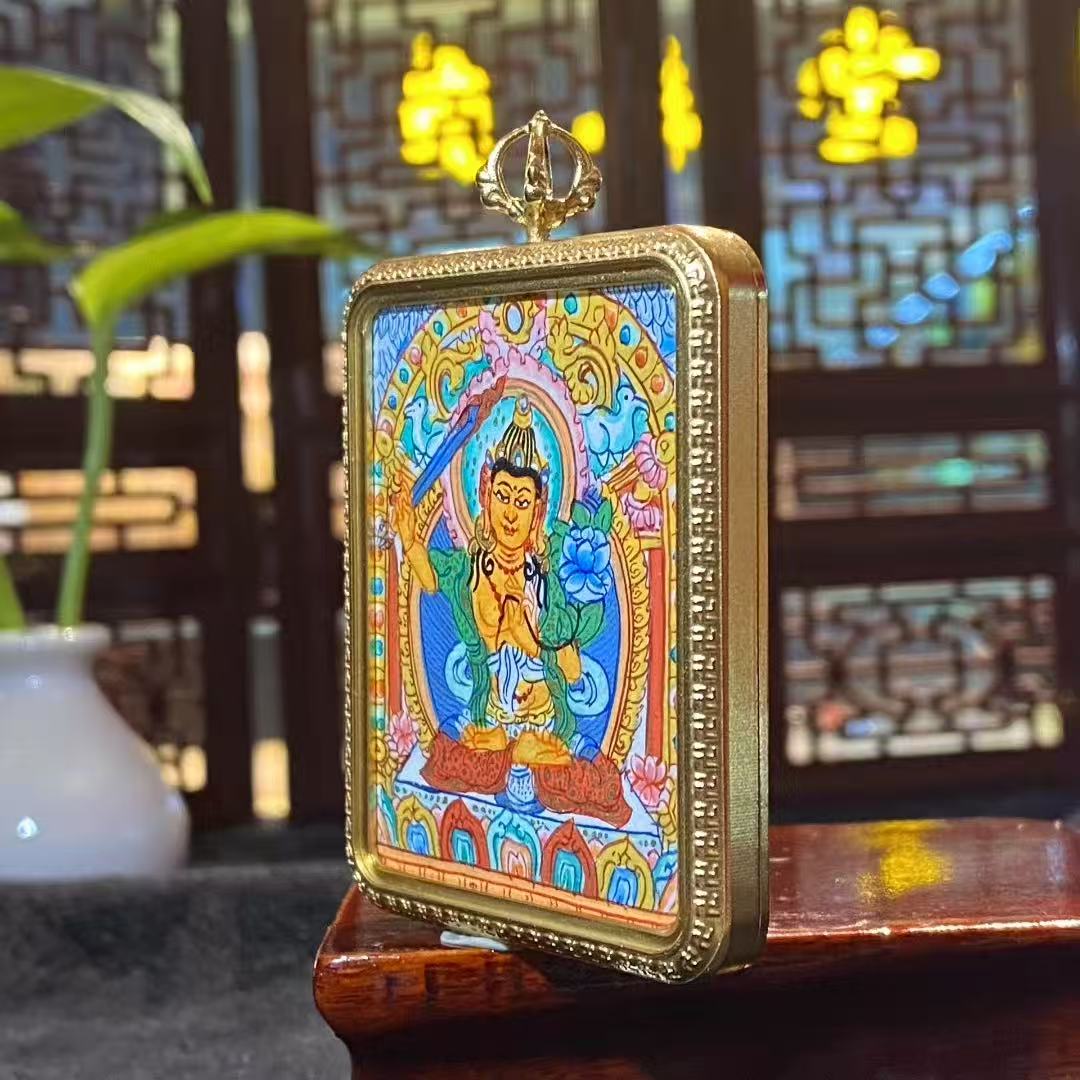 Hand-painted Manjushri Bodhisattva large mini thangka pendant in a titanium steel Gau box, depicting the Buddhist deity of wisdom