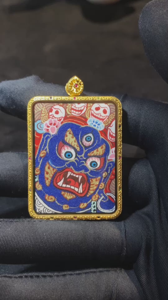 Video showcasing a Samantabhadra Bodhisattva and Mahakala thangka pendant, fully hand-painted with 18K gold on both sides, Rebgong Tibetan art, sapphire crystal Gawu box, front and back details