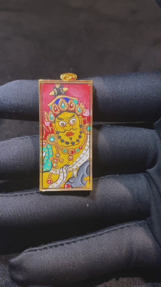 360-degree view of Yellow Jambhala and Wealth Mantra double-sided Gau Thangka pendant in 18K gold, hand-painted Rebgong art with sapphire crystal mirror and elongated design