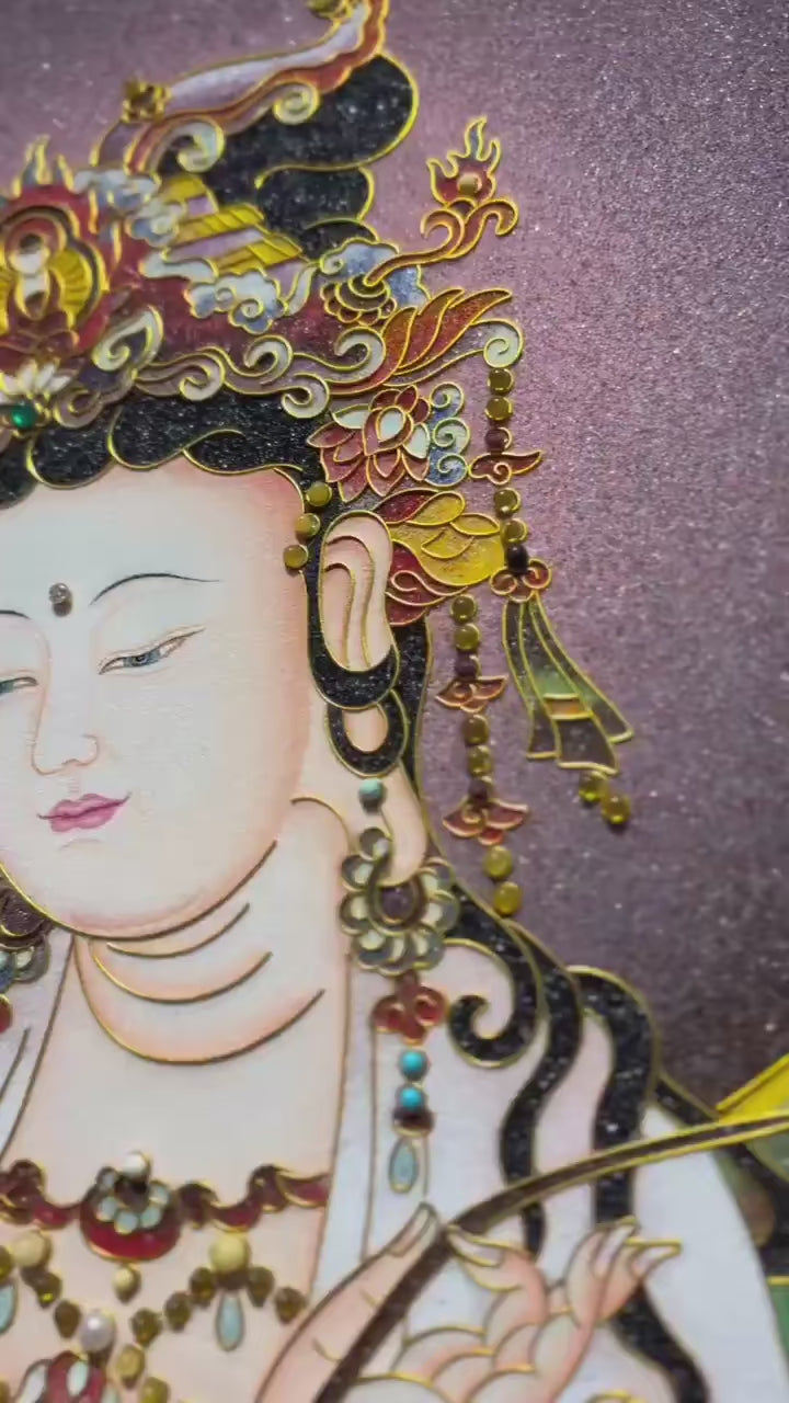 This video presents a Dragon-Riding Avalokiteshvara (Nanhai Guanyin) gemstone thangka, hand-painted in the Rebgong tradition using natural gemstone and mineral pigments. Featuring a solid rosewood frame and a painting size of 123 × 83 cm, this artwork reflects the depth, symbolism, and craftsmanship of traditional Himalayan Buddhist art.