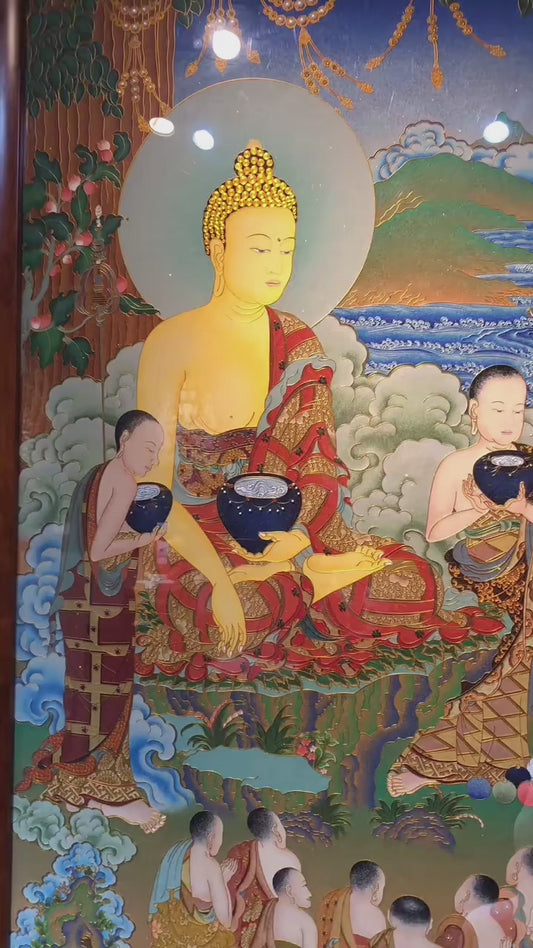 Video showcasing a large hand-painted Rebgong gemstone thangka of Shakyamuni Buddha attaining enlightenment beneath the Bodhi tree and teaching the Dharma, framed in solid pearwood with luminous mineral pigments