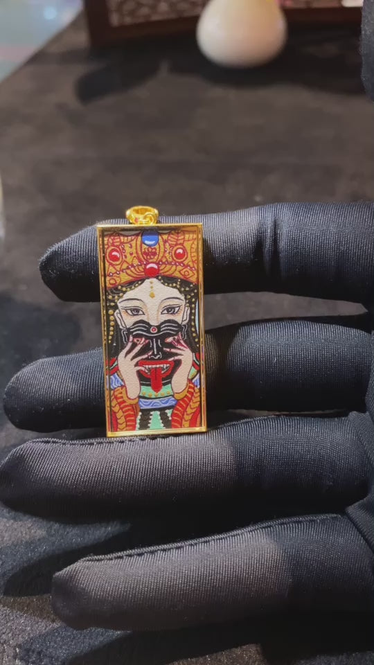 Video showcasing a hand-painted double-sided Tibetan thangka featuring Zaki Lhamo and the Five Wealth Deities in an 18K gold gau box, highlighting front, side, and back details