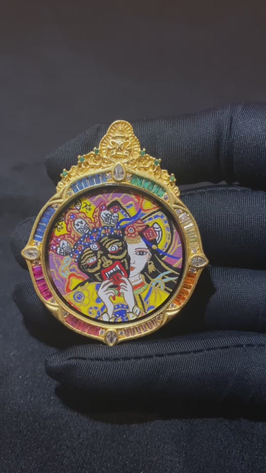Video showcasing a hand-painted single-sided Zaki Lhamo thangka pendant in a circular rainbow copper gau box, highlighting front details, side profile, and craftsmanship
