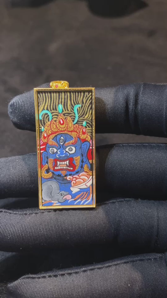 Video showing a Black Jambhala and Five Wealth Deities thangka pendant, fully hand-painted with 18K gold on both sides, Rebgong Tibetan art, sapphire crystal Gawu box, front and back details