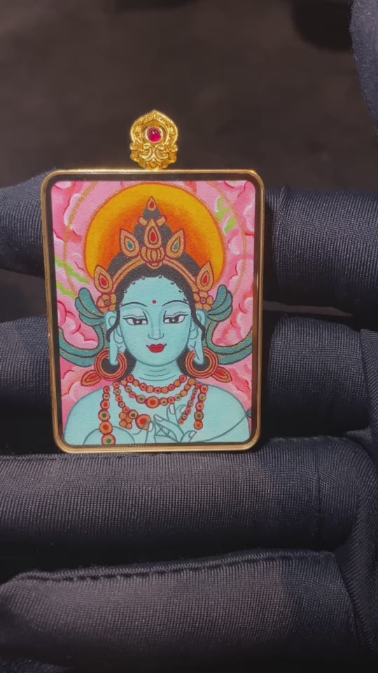 360-degree view of Yellow Jambhala and Yamantaka double-sided Gau Thangka pendant in 18K gold, hand-painted Rebgong art with sapphire crystal mirror