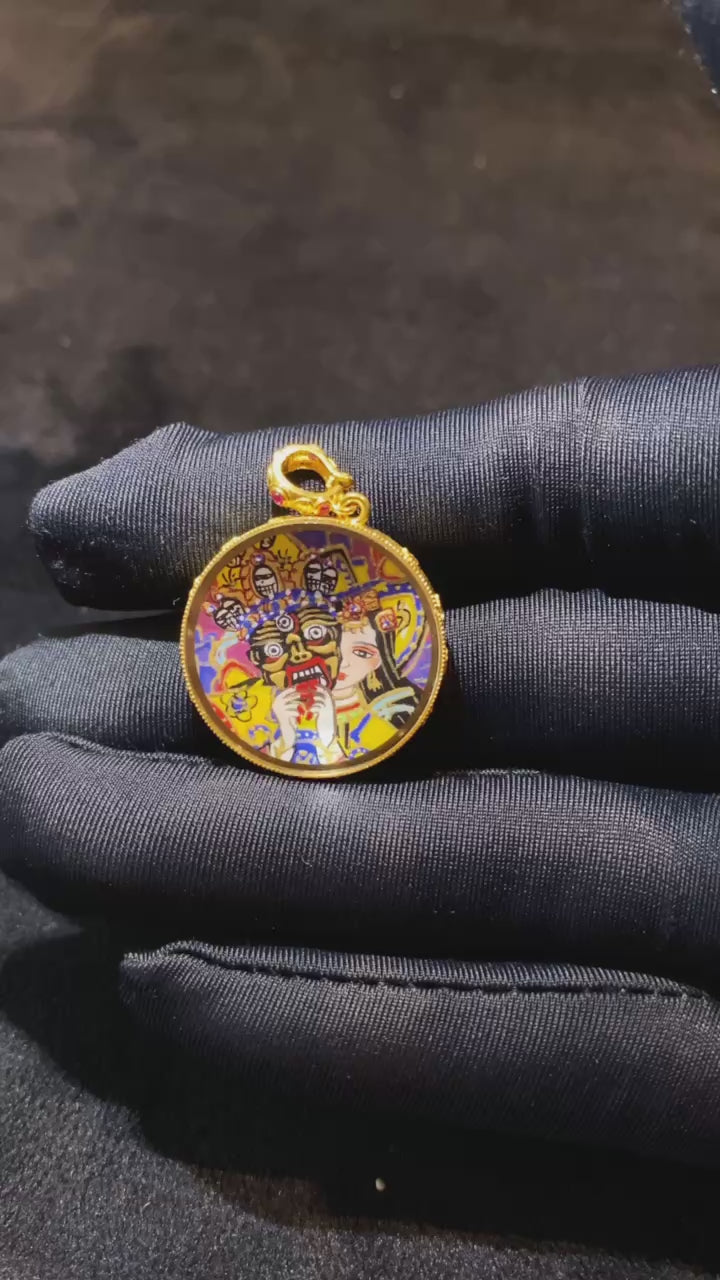 Video showcasing a double-sided Tibetan Ghau Thangka pendant with Zaki Lham and Zaki mantra seed syllable, hand-painted in 18K gold with Rebgong Thangka craftsmanship and sapphire glass protection