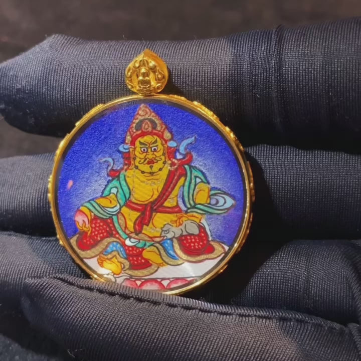 360-degree view of Yellow Jambhala and Wealth-Spouting Mouse double-sided Gau Thangka pendant in 18K gold, hand-painted Rebgong art with sapphire crystal mirror, circular 32 mm design