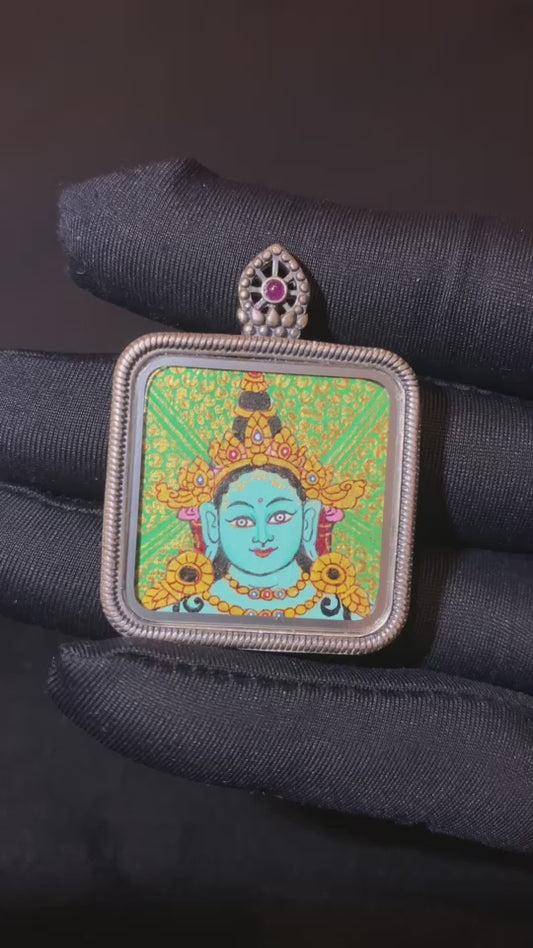Video for Hand-painted Green Tara thangka pendant in an S925 silver Ghau box, engraved with the Eight Auspicious Symbols for harmony, protection, and peace.