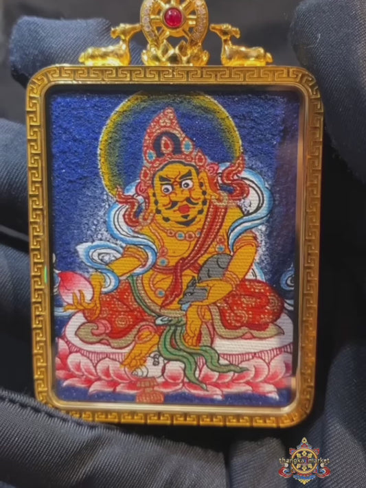 Yellow Jambhala and Green Tara double-sided Gau Thangka pendant presented in a premium gift box, a refined Himalayan spiritual jewelry piece