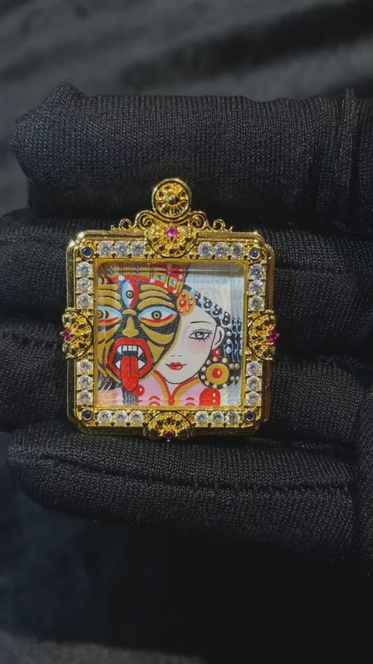 Video showcasing a hand-painted Zaki Lhamo mini thangka pendant in a compact copper gau box, highlighting front artwork details, side thickness, and back metal craftsmanship